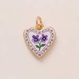 Detailed macro shot of a heart-shaped pendant with a purple pansy floral design