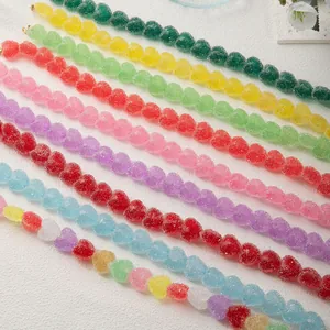 Vibrant candy-style resin heart necklaces in various colors displayed on a white surface