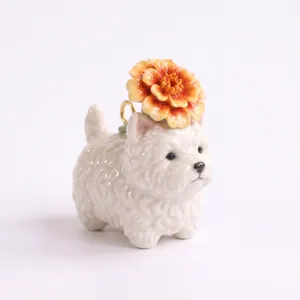 Close-up of cute ceramic white puppy pendant with an orange flower for DIY jewelry