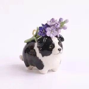Detailed view of a ceramic puppy charm with purple flowers for handmade DIY jewelry projects.