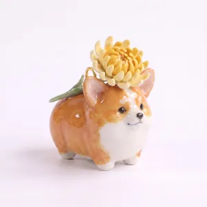 Detail of cute Corgi dog pendant with yellow chrysanthemum flower for DIY jewelry making