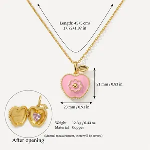 Elegante collar de relicario de melocotón rosa en cobre con detalle floral y corazón