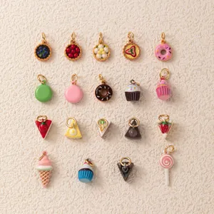 Assorted cute dessert charms including donuts, cakes, and macarons for DIY jewelry