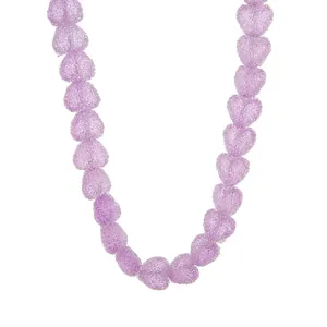 Detailed view of cute purple resin heart necklace with candy-like textured beads.