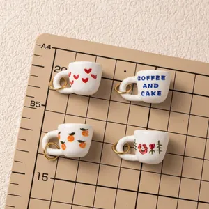 Set of four miniature printed ceramic coffee cup charms for DIY jewelry making projects