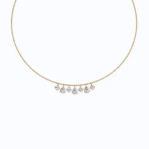 Minimalist gold chain necklace with sparkling pear and round zircon fringe charms
