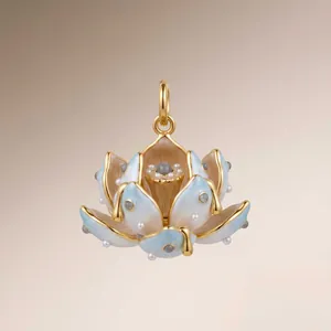 Detailed macro view of 3D lotus pendant with blue enamel, pearls, and grey zircons
