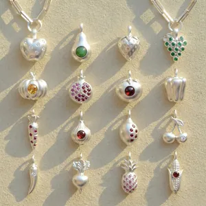 Diverse fruit and vegetable silver charms with colorful zircon accents for DIY jewelry.