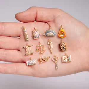 Detailed collection of colorful enamel stationery charms for DIY jewelry making