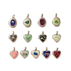 Collezione di ciondoli a medaglione floreale cuore e ovale per creazione gioielli DIY