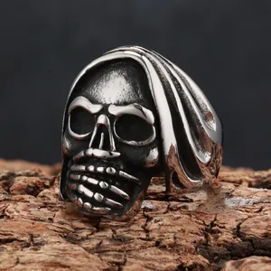 High-definition macro detail of a hooded Grim Reaper skull ring in vintage titanium steel