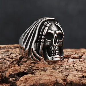 Close-up of vintage titanium steel skull ring with Grim Reaper hood detail