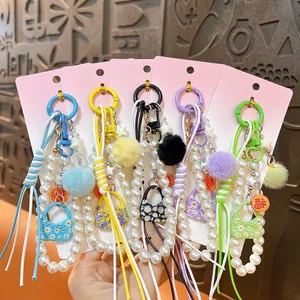 Colgante para Bolso con Cuentas Mini Bolso Floral Llavero de Perla Artificial con Bola de Peluche Accesorio de Cordón DIY para Decoración de Bolso de Mujer