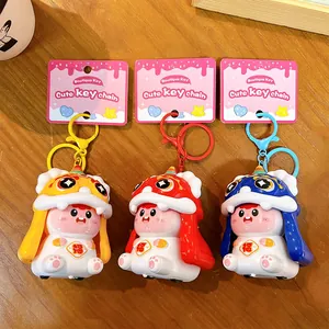 Set van drie creatieve Chinese leeuwendans sleutelhangers met druk- en schuifmechanisme