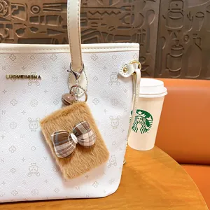 Plush bow mirror keychain bag charm with brown faux fur and plaid bow decoration