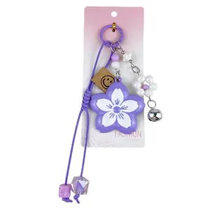 Cute purple sakura flower keychain with braided rope and beads for bag accessory