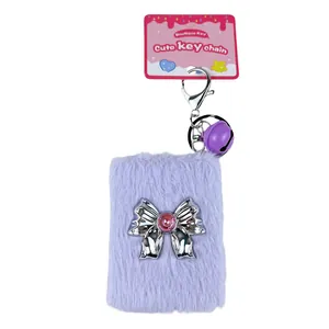 Cute purple plush folding makeup mirror keychain with a silver bow and bell charm