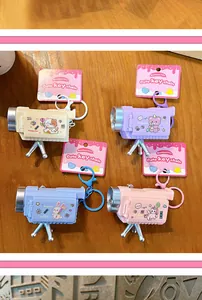 Detailed view of creative cartoon animal projector camera keychains for kids and students