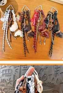 Handmade vintage leather puppy keychains in four colors with stylish braided rope details