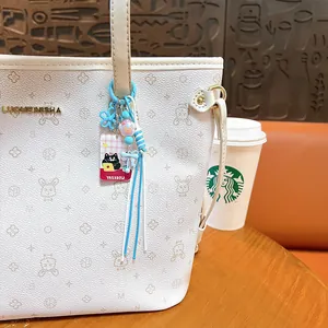 Creative blue and white cat bag charm with tassel and 'Workday' cat acrylic pendant