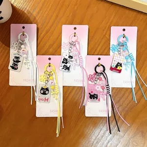 Creative cute cartoon cat bag charms and keychains in five vibrant colors set.