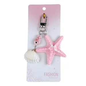 Ozean-Schlüsselanhänger mit rosa Seestern, Muschel und Fisch für Taschen oder Schlüssel