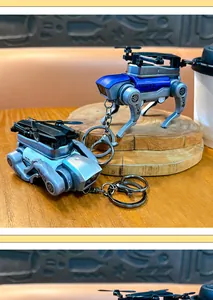 Detailweergave van mechanische robothond sleutelhanger met draaiend propellerontwerp