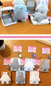 Detail view of plush bear folding mirror keychains available in multiple soft colors