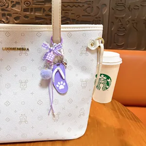 Cute purple flip-flop bag charm with checkered bow and paw print for girl's keychains