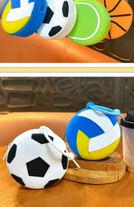 Macro view of silicone sport ball coin purses featuring soccer and volleyball patterns