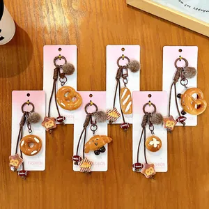 Set of cute Maillard-style bread keychains including pretzel and croissant shapes