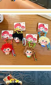 Detailed view of colorful creative exploding hair doll keychains for bags and keys
