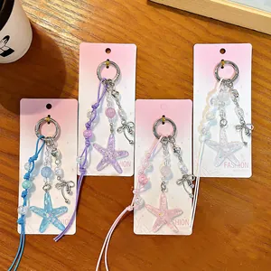 Colorful acrylic starfish keychains for bags featuring cute beads and bow charms.