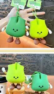 Detailed view of cute green onion shaped coin purse keychains in two shades of green