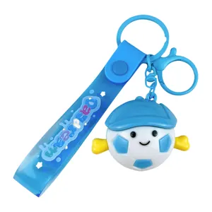 Porte-clés figurine football de dessin animé avec sangle en silicone bleu décor