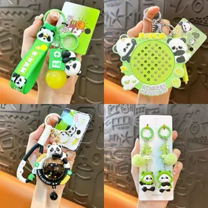 Detailed collection of adorable green panda-themed keychains and bag charm accessories