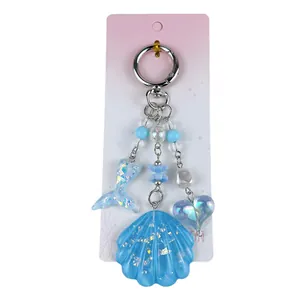 Joli porte-clés bleu en acrylique avec coquillage et queue de sirène pour sac