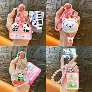 Detailed view of various cute cartoon panda keychains and squishy charms for bag decoration