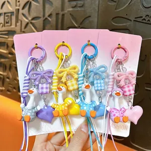 Cute Bobblehead Duck Keychain Resin Dotted Pajama Duck Bag Charm Cartoon Heart Bow Pendant Keychain For Women Girls Accessories Gift