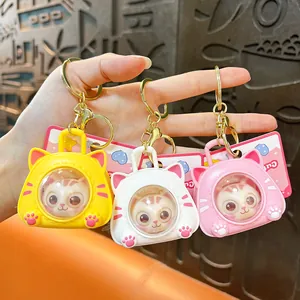 Cute cat space capsule keychains in yellow white and pink colors