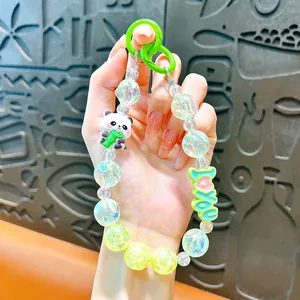 Detailed view of cute panda keychain with iridescent beads and 'LOVE YOU' charm.