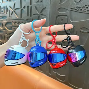 Set of cool mini motorcycle helmet keychains in various colors for bags and keys