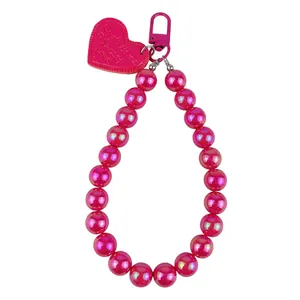 Vibrant candy pink AB beaded phone strap with heart charm and secure lobster clasp