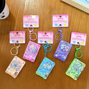 Set of colorful cartoon dice machine keychains with cute animal designs for stress relief
