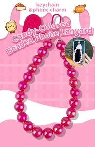 Vibrant pink iridescent AB bead phone charm with a heart-shaped accessory detail