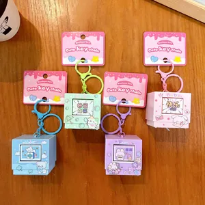 Set of colorful cartoon push pop fidget toy keychains with cute animal designs