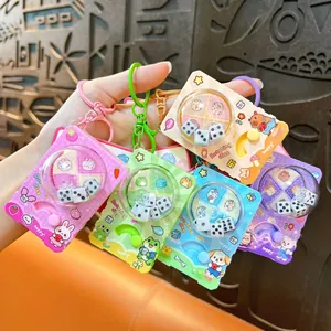 Set of five colorful cartoon rotating dice machine keychains for student stress relief toys