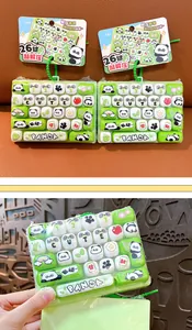 Close-up detail showing the textured keys and cute panda design of the fidget keyboard.