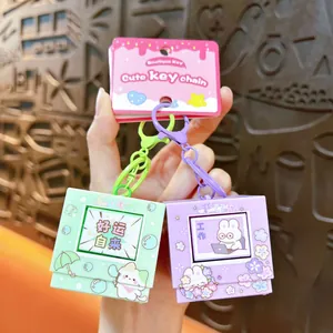 Handheld cartoon light-up and sound flip fidget keychain toy for stress relief and bag decoration