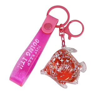 Porte-clés poisson liquide mignon avec étoiles scintillantes et lanière rose